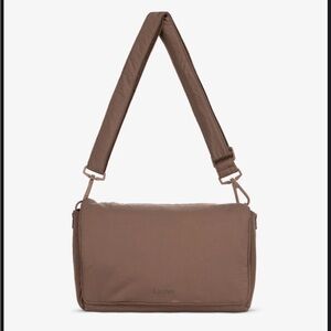 Calpak stroller caddy in color hazelnut